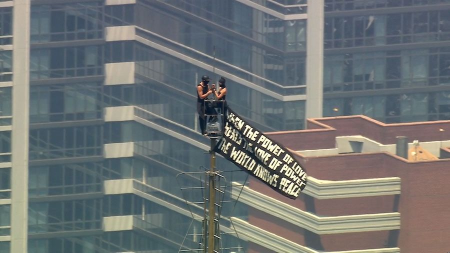Masked Climbers Scale Empire State Building's Antenna, Unfurl Symbolic Pro-Peace Banner in Protest